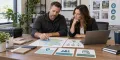 Mold remediation company owner and marketing strategist reviewing a service territory map and call-routing plan